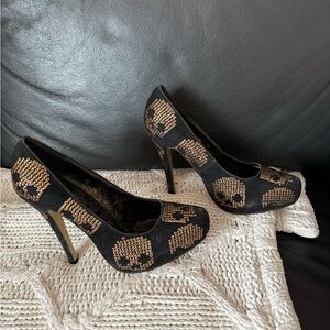 Iron Fist Black Heels with Gold Skull Design